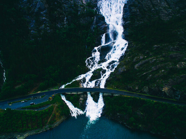 Summer mountain Langfoss waterfall on slope (Etne, Norway). Aerial drones photo