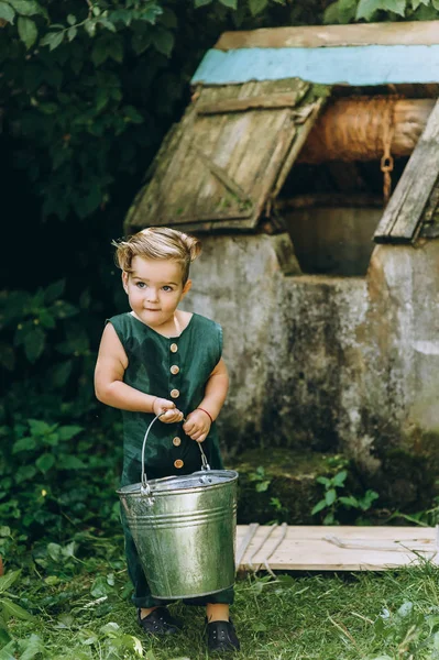 Boy White Hair Green Combination Plays Bucket Grass — Stock Photo, Image