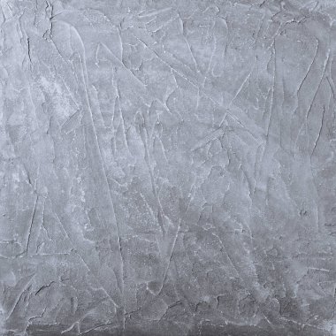 Gri renk veya duvarın sanatsal desenli beton arkaplanı.