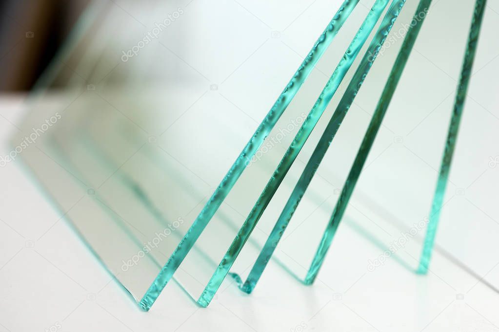 Sheets of Factory manufacturing tempered clear float glass panels cut to size