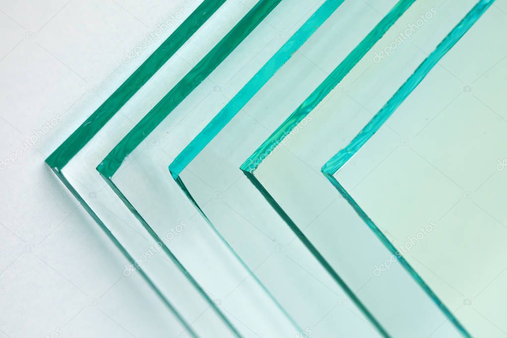 Sheets of Factory manufacturing tempered clear float glass panels cut to size