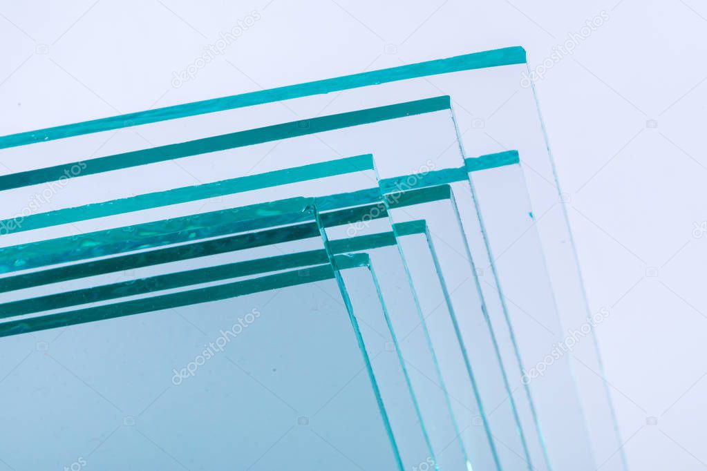 Sheets of Factory manufacturing tempered clear float glass panels cut to size