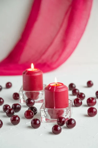 Spa candles with cherry aroma on white background. Aromatherapy — Stock Photo, Image