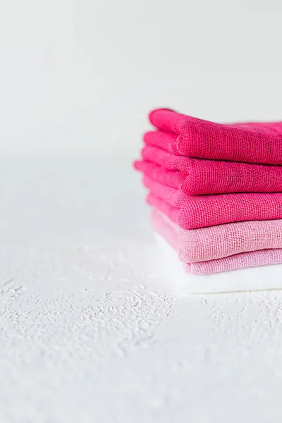 Pink and white textile on white background