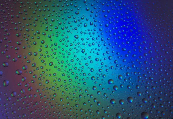 Wassertropfen Mit Reflexion Des Regenbogens Leuchtende Oberfläche Hintergrund — Stockfoto