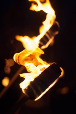 Burning torches in the dark