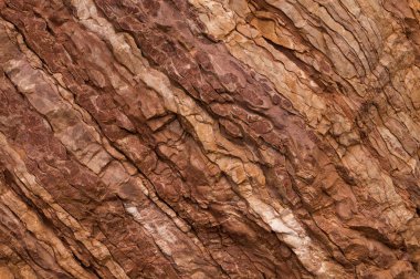 Kırmızı ve kahverengi renklerin taş dokusu