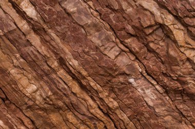 Kırmızı ve kahverengi renklerin taş dokusu