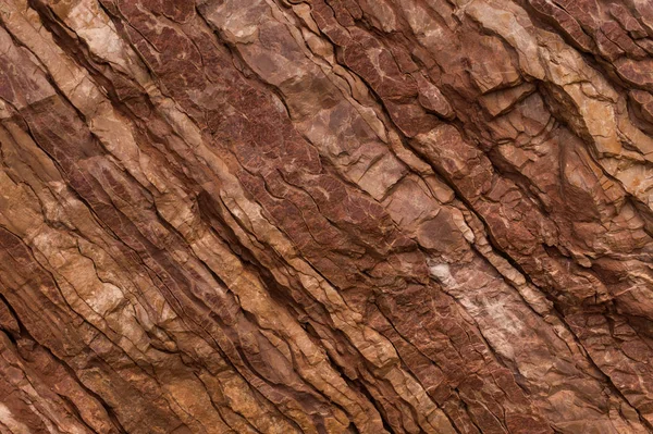 Kırmızı ve kahverengi renklerin taş dokusu
