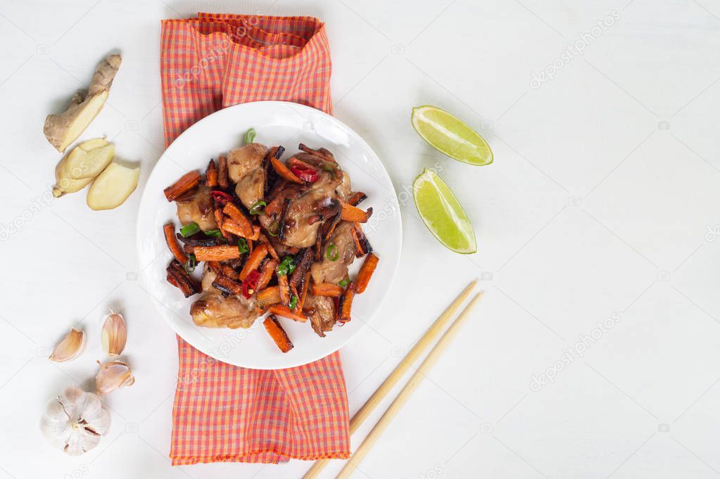 Chicken and teriyaki sauce ingredients on a white background