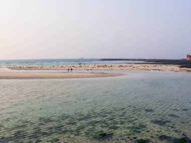 Hyeopiae Sahili 'nde günbatımı. Jeju Adası, Güney Kore 'de.