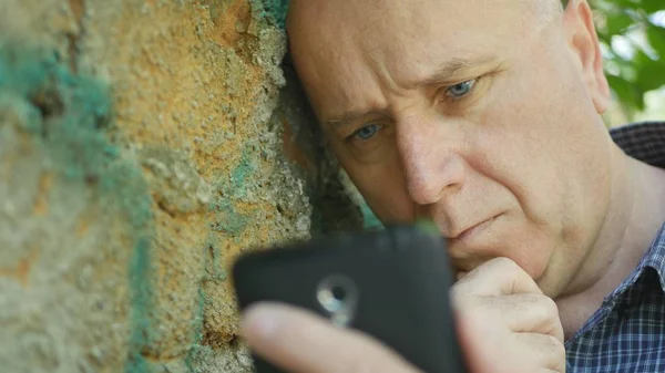 stock image Disappointed Person Looking to Cellphone Worried and Helpless