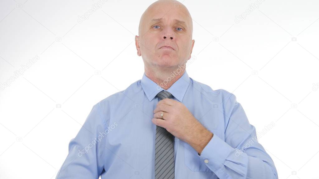 Businessman Arranging His Tie Before a Business Meeting