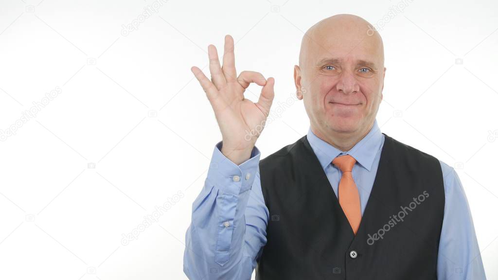 Businessman Image Smiling and Making  Ok Sign Good Job Hand Gestures