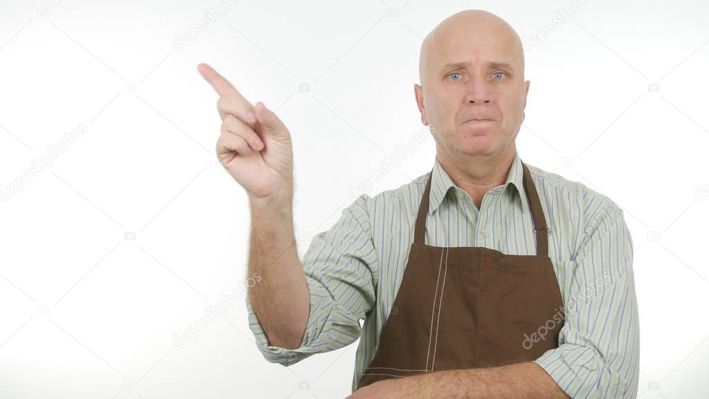 Serious Man With Apron Attention Sign a Warning Hand Gestures