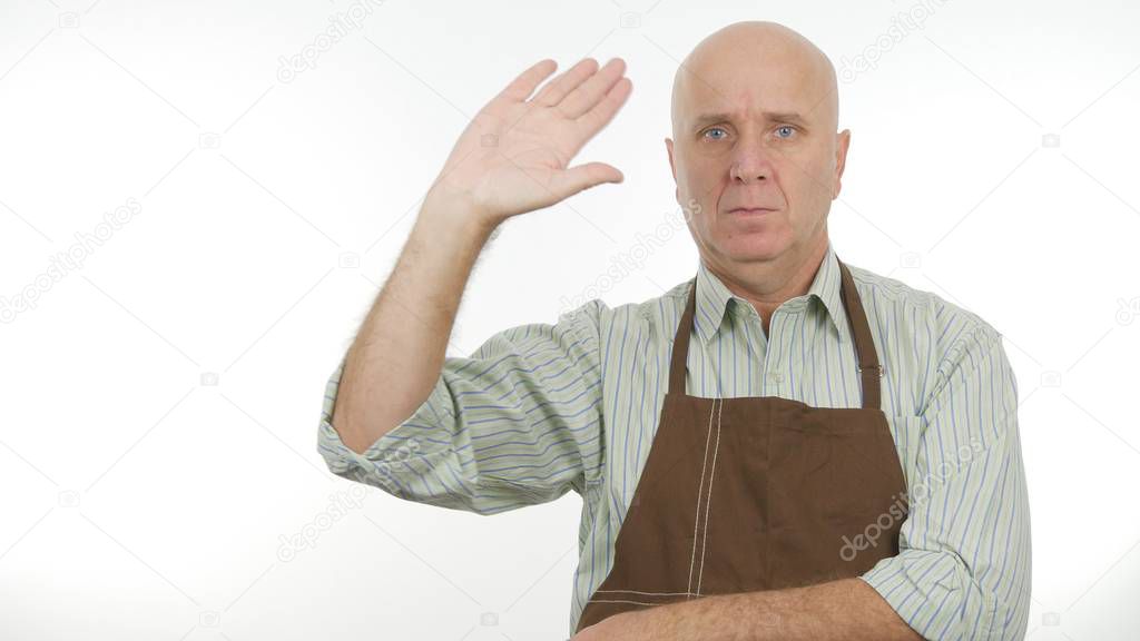 Man With Apron Make Hello Sign a Salute Hand Gestures