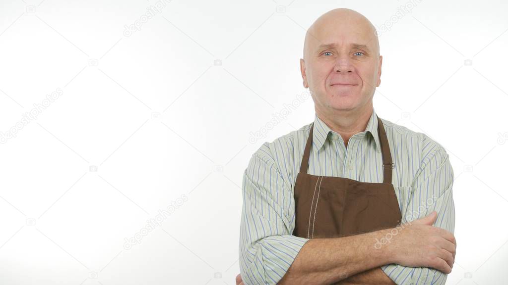 Happy Image with a Man Wearing Apron Keeping Arms Crossed