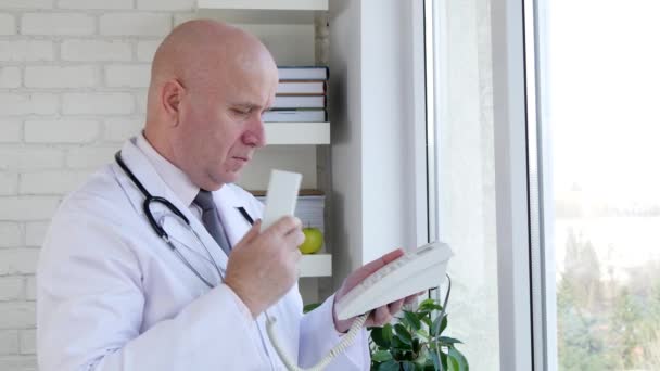 Disappointed Doctor Try Use Telephone Dialing Busy Line — Stock Video