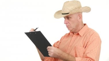 Ciddi çiftçi çalışma Pano yazma tarım bilgileri kullanarak notlar alır