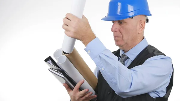 Seriöser Ingenieur arbeitet mit Plänen auf weißem Hintergrund — Stockfoto