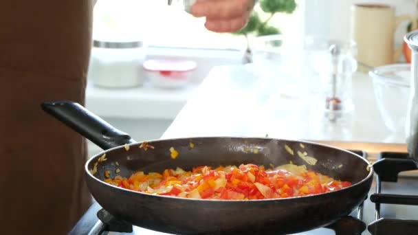 Man Working Kitchen Put Salt Chopped Vegetables Mix Pan Hot — Stock Video