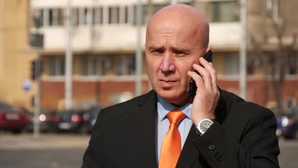 Desperate Businessman Gesturing Irritated Talking Cellphone Hears Bad News — Stock Video