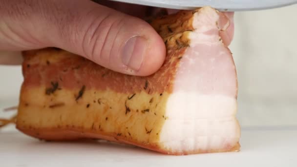 Close Up Image of Kitchen Activity Man Using a Knife and Cutting a Slice of Ham — Stock Video