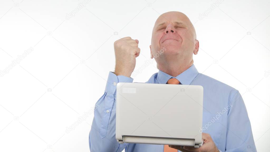 Businessman Read Online Good News on Laptop and Make Enthusiastic Hand Gestures