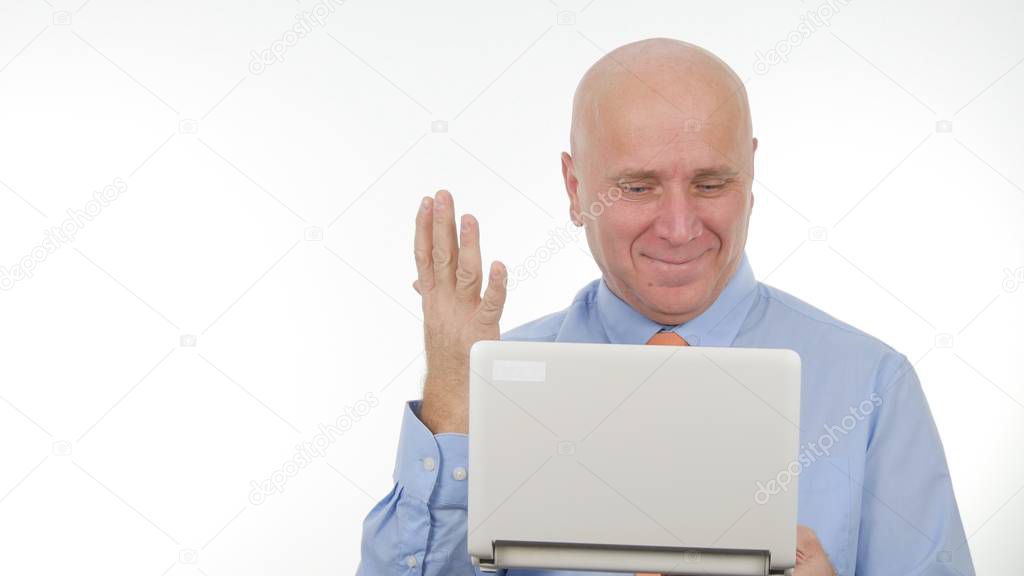 Businessman Read Online Good News on Laptop and Make Enthusiastic Hand Gestures