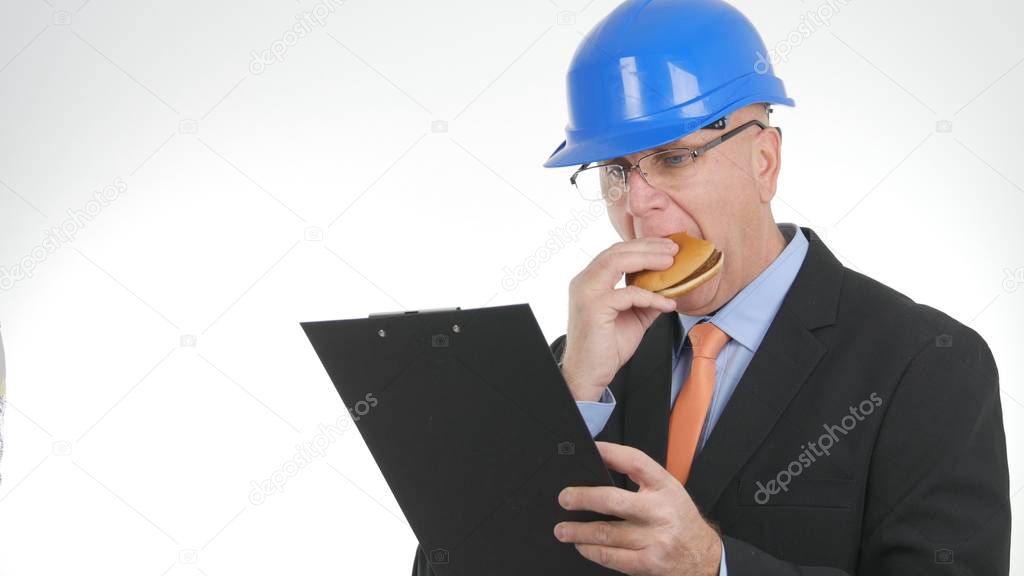 Starved Engineer Enjoy a Tasty Snack and Read Documents