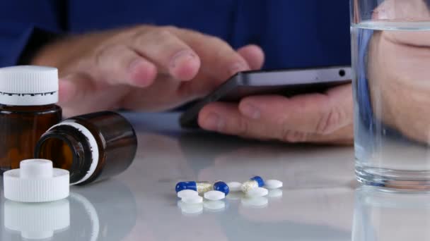 Man Searching Online Pills Prescription Using Cellphone Internet Connection — Stock Video