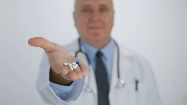 Confident Doctor Smiling Presenting Hand New Treatment Colored Pills — Stock Photo, Image