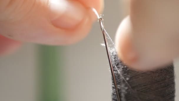 Extreme Close Image Man Fingers Introducing Sewing Thread Needle — Stock Video