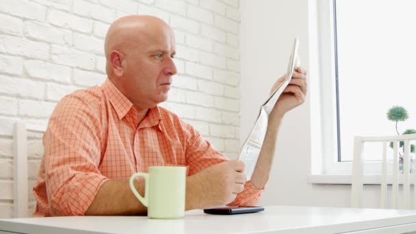 Man Office Relaxing Drinking Coffee Reading Newspaper Latest News — Stock Video