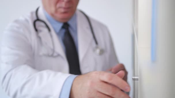 Doctor Job in Medical Cabinet Taking Documents from a Drawer of the Cabinet — Stock Video