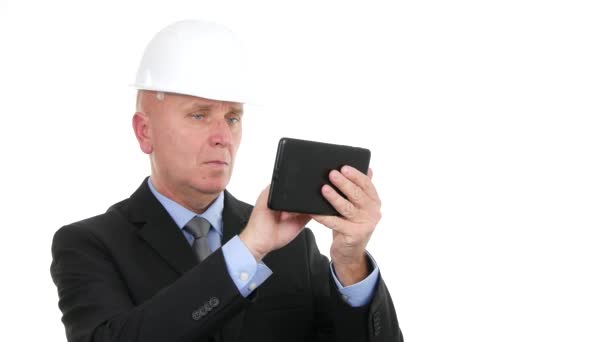 Serious Businessman Wearing Helmet Text Using Tablet Internet Communication — Stock Video