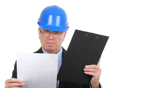 Image with Engineer Reading Technical Plans for a Building Construction — Stock Photo, Image