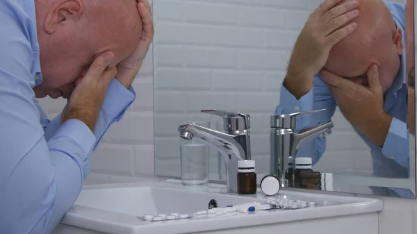 Businessman Suffering a Big Pain Near Medical Pills in Bathroom — 스톡 사진