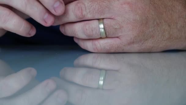 A Man Taking Out His Wedding Ring from the Finger, a Divorce Symbol, Person Refusing the Marriage — Stock Video