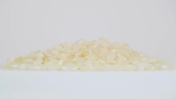 Close Up Image with a Pile of Rice Rotated in Slow Motion Presentation, Aziatisch voedsel vol eiwitten en vitaminen — Stockvideo