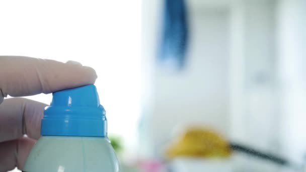 Nurse Hand Protected with a Surgical Glove Sprays a Medical Disinfectant Substance — Stock Video