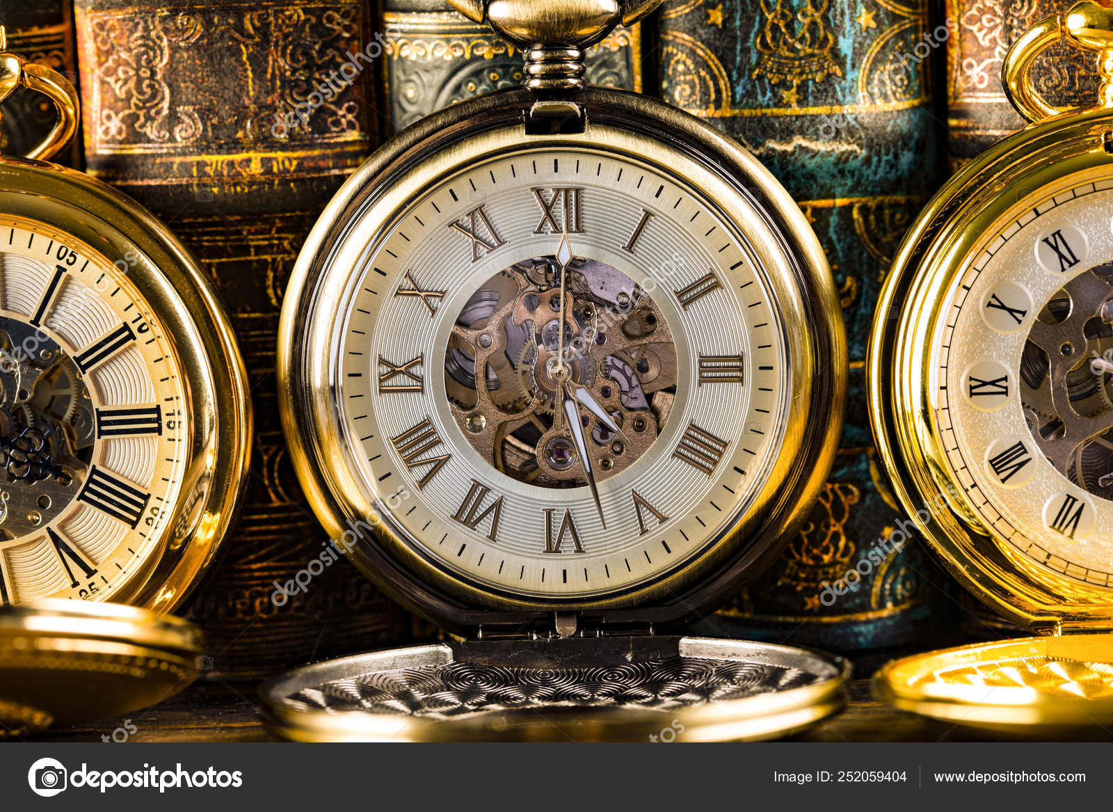 Antique clocks on the background of vintage books. Mechanical cl — Stock  Photo © RUl8let #252059404, image size:1600x1167