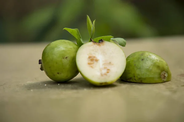 guava fruit and slice on nature background. guava fruit top view on nature background.