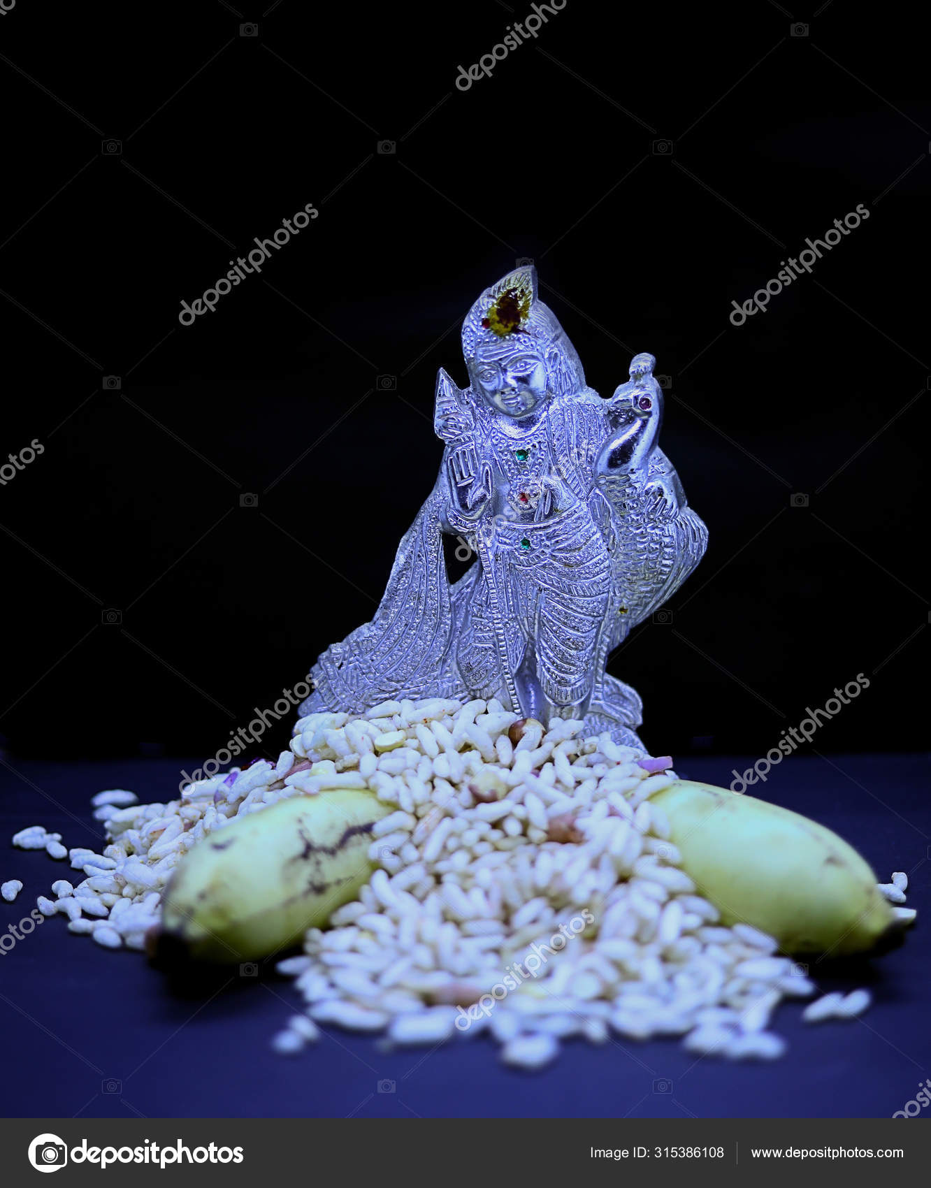 Saraswathi Pooja and Ayudha Pooja Celebrations Silver idol Murugan with banana and pori on