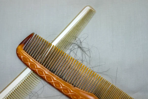 Hairs fall in comb, hair fall everyday serious problem.