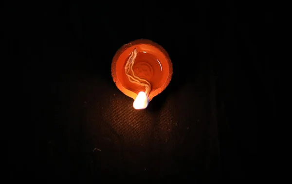 Happy Diwali celebration - Diya oil lamps on dark background — Stock Photo, Image
