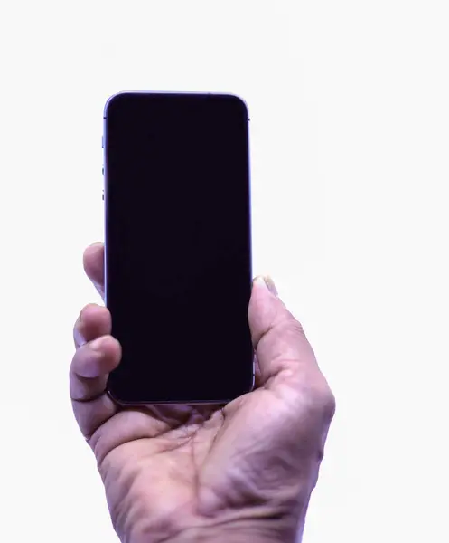 Hand holding phone isolated on white background — Stock Photo, Image