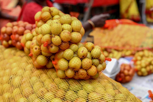 close up on Jujube fruits vendor sells fruits on a street
