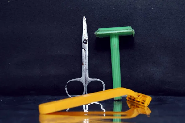 hairdresser\'s tools brush and razors, scissors