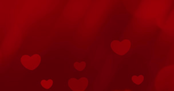Анімовані Романтичні Червоні Серця Червоному Тлі Ефектами Боке День Святого — стокове відео
